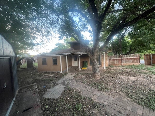 exterior space featuring a shed