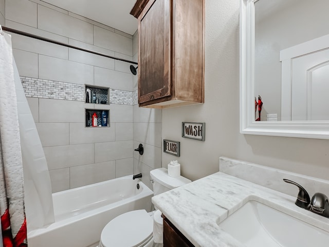 full bathroom featuring shower / bath combo, toilet, and vanity