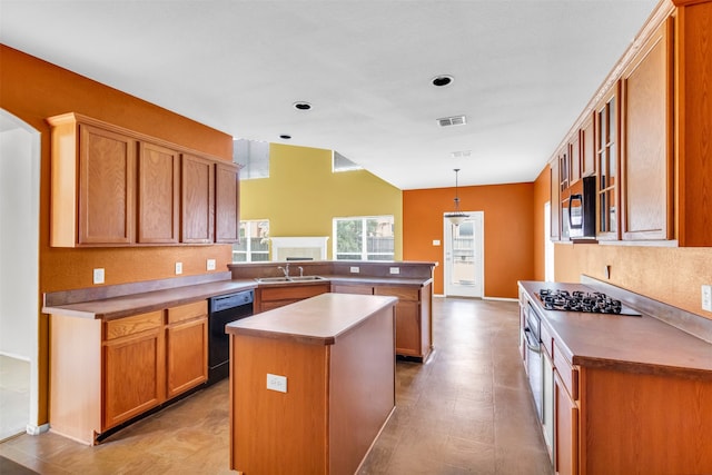 kitchen featuring kitchen peninsula, black dishwasher, hanging light fixtures, sink, and a center island