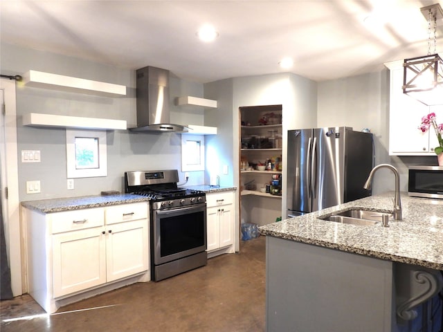 kitchen with white cabinetry, sink, wall chimney range hood, light stone counters, and appliances with stainless steel finishes