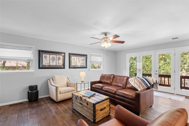 living room featuring ornamental molding, dark wood-type flooring, french doors, and ceiling fan