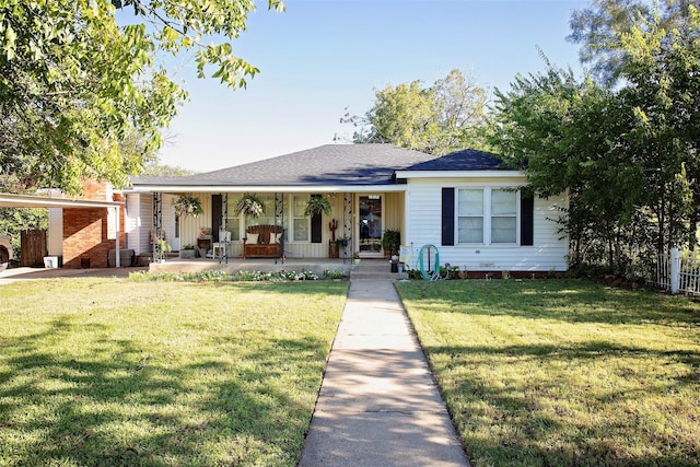 ranch-style home featuring a porch and a front lawn