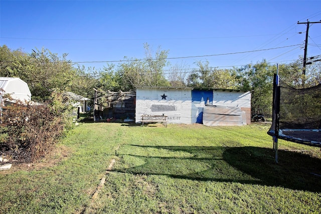 view of yard featuring a trampoline