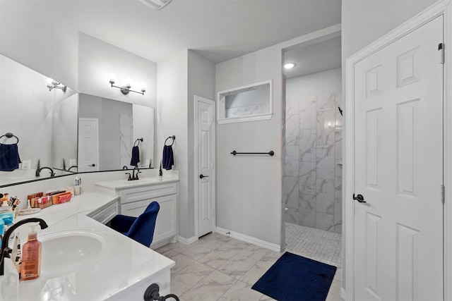 bathroom featuring vanity and a tile shower