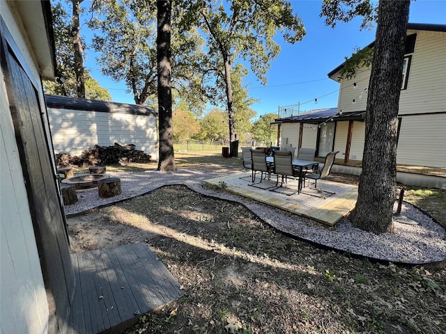 view of yard featuring a patio and fence