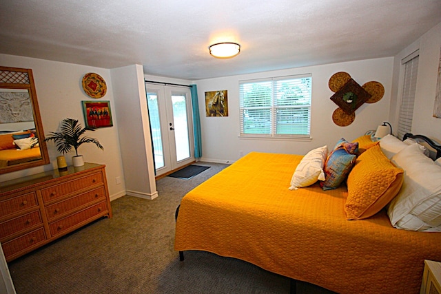 carpeted bedroom featuring access to exterior, baseboards, and french doors