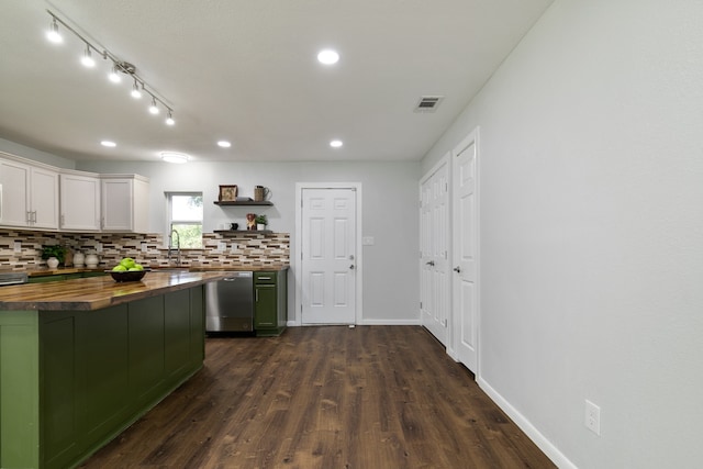 kitchen with dark wood-type flooring, white cabinets, green cabinets, wooden counters, and stainless steel dishwasher