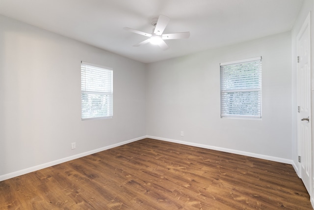 spare room featuring ceiling fan and hardwood / wood-style flooring