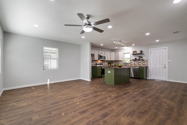 kitchen with white cabinetry, dark hardwood / wood-style floors, and ceiling fan