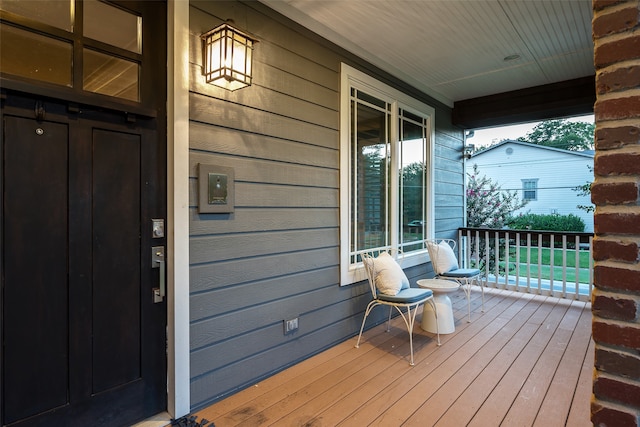 deck with covered porch