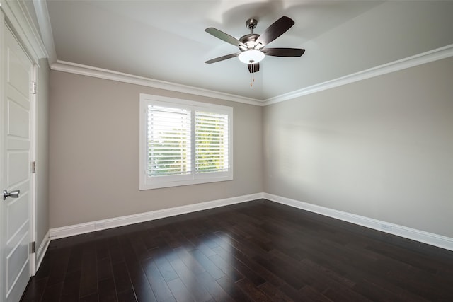 spare room with ceiling fan, dark hardwood / wood-style flooring, and crown molding