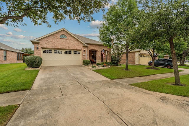 ranch-style home with a garage and a front lawn