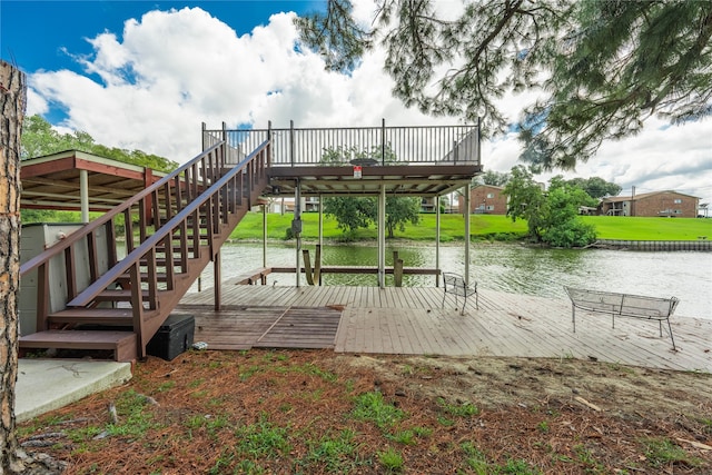 exterior space with a deck with water view