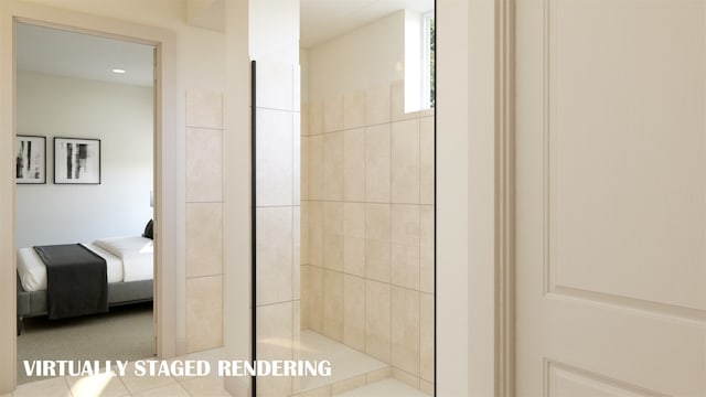 bathroom with a tile shower