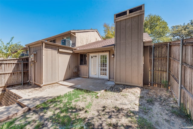 rear view of house with a patio