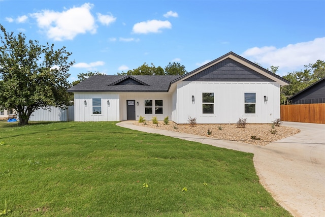 view of front of home with a front yard