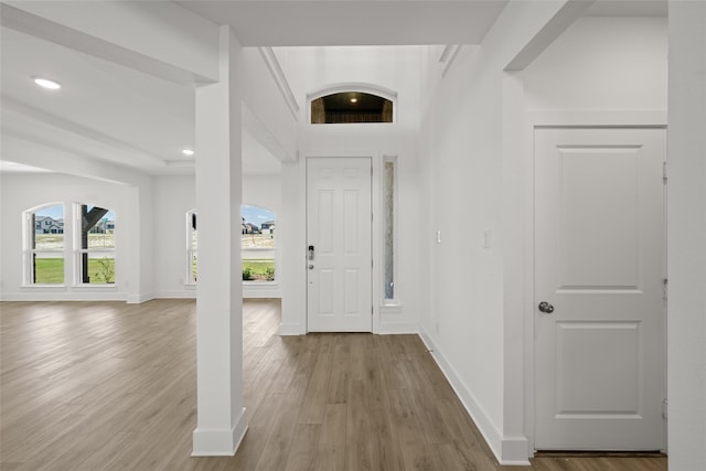 corridor with light wood-type flooring