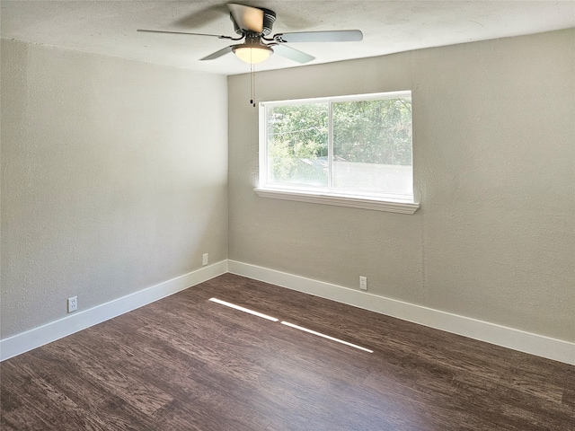 unfurnished room featuring ceiling fan and hardwood / wood-style flooring