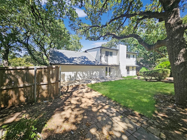 exterior space with a lawn