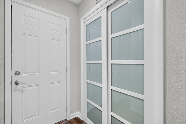 doorway to outside featuring hardwood / wood-style floors