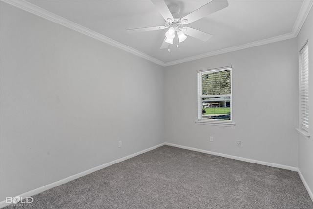 empty room with crown molding, carpet floors, and ceiling fan