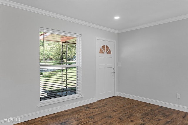 entryway with dark wood-type flooring and ornamental molding