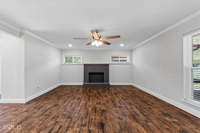 unfurnished living room featuring ornamental molding, dark hardwood / wood-style flooring, and a fireplace