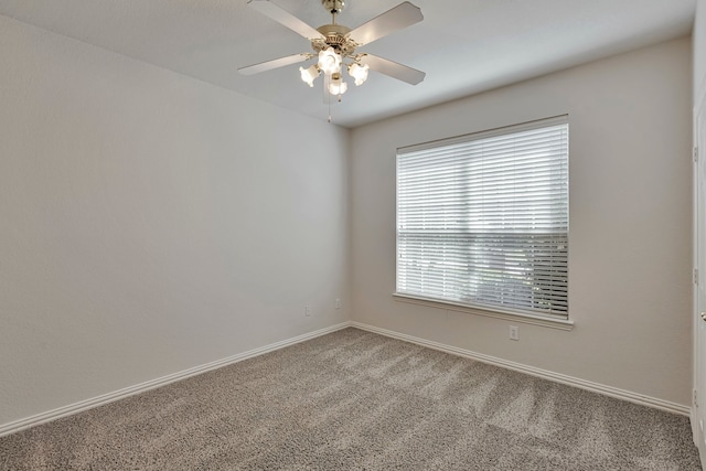 unfurnished room featuring carpet flooring and ceiling fan