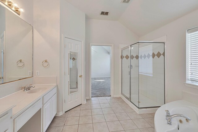 full bathroom featuring tile patterned flooring, tiled shower / bath, toilet, and vanity