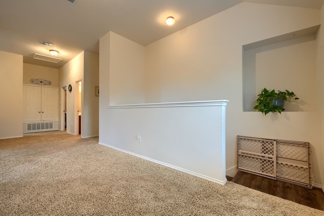 stairs featuring wood-type flooring and ceiling fan