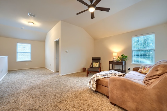 carpeted living room featuring lofted ceiling and ceiling fan