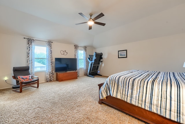 interior space featuring ceiling fan, carpet flooring, and lofted ceiling