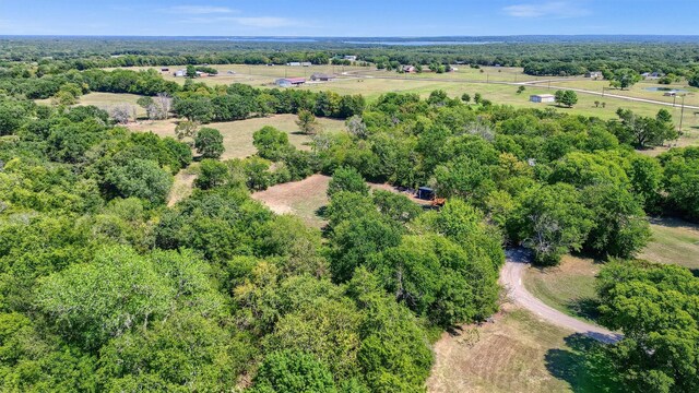 birds eye view of property featuring a rural view