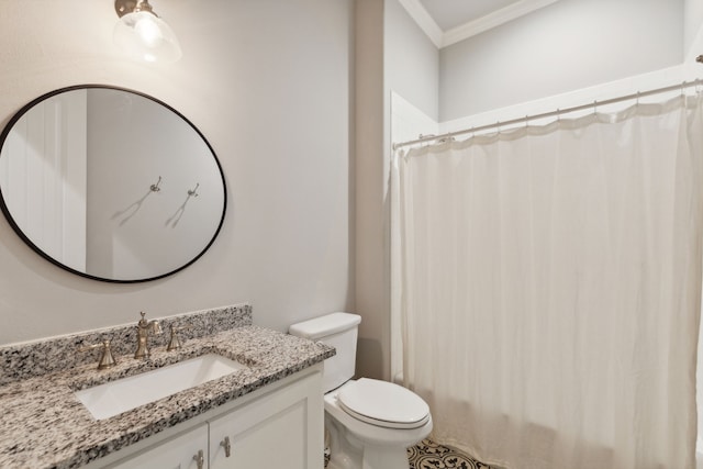 bathroom featuring vanity, toilet, ornamental molding, and walk in shower