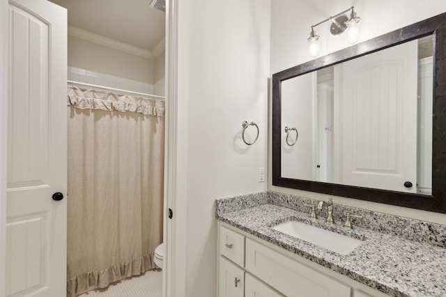 bathroom featuring vanity, crown molding, tile patterned flooring, toilet, and curtained shower