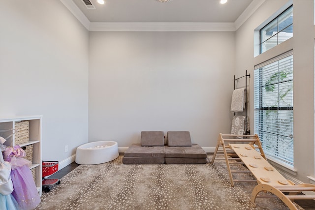 interior space with wood-type flooring and ornamental molding