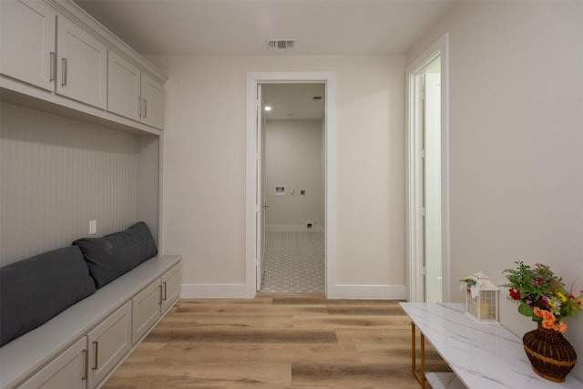 mudroom featuring light wood-type flooring