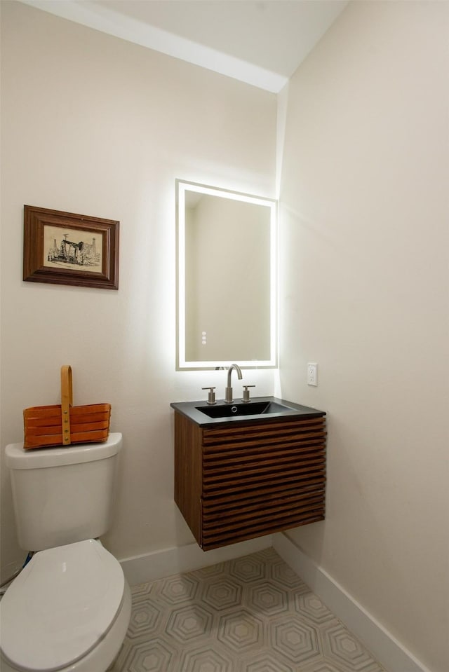 bathroom featuring sink and toilet