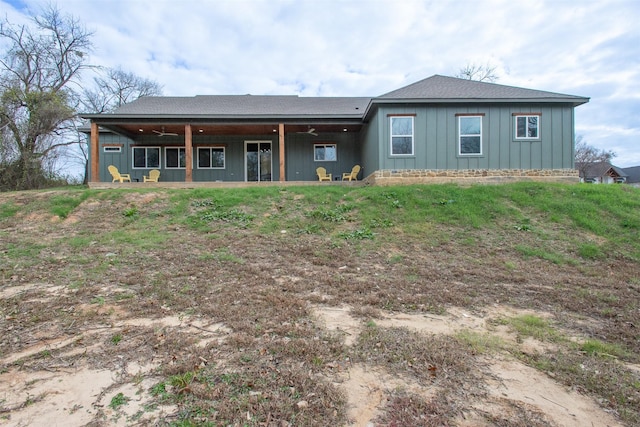 back of house with ceiling fan