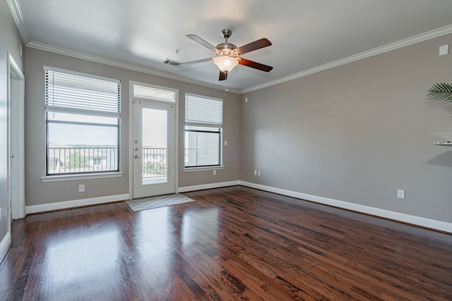 spare room with ornamental molding, ceiling fan, and dark hardwood / wood-style flooring