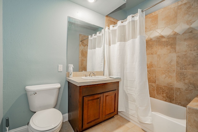 full bathroom with vanity, tile patterned floors, toilet, and shower / bath combo