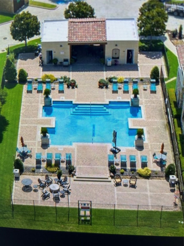 view of pool featuring a patio area