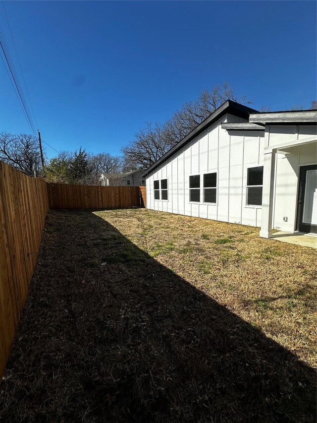 view of property exterior featuring a yard