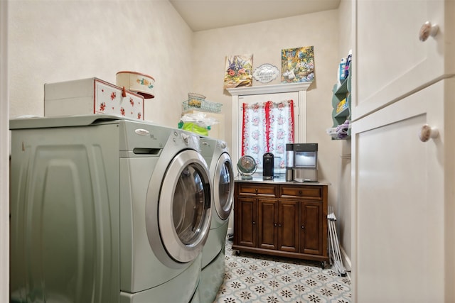 laundry room featuring washing machine and dryer