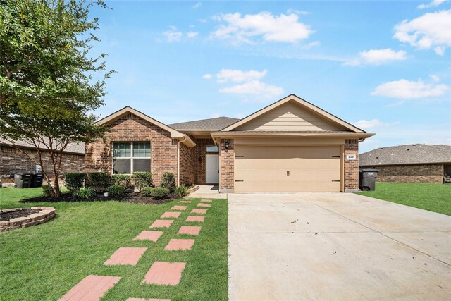 single story home with a garage and a front yard