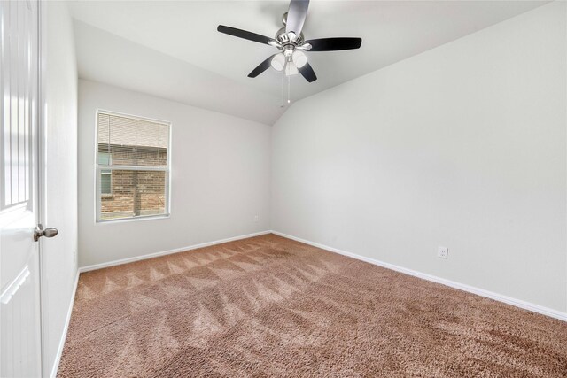 unfurnished room featuring ceiling fan and carpet floors