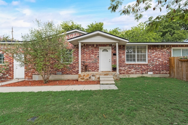 ranch-style house with a front lawn