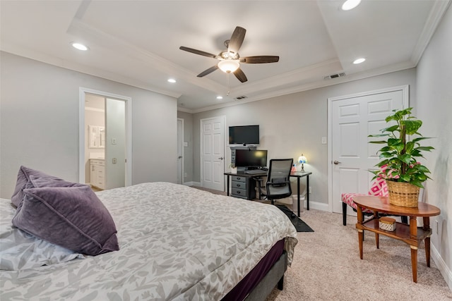 bedroom featuring ceiling fan, a tray ceiling, crown molding, and light colored carpet