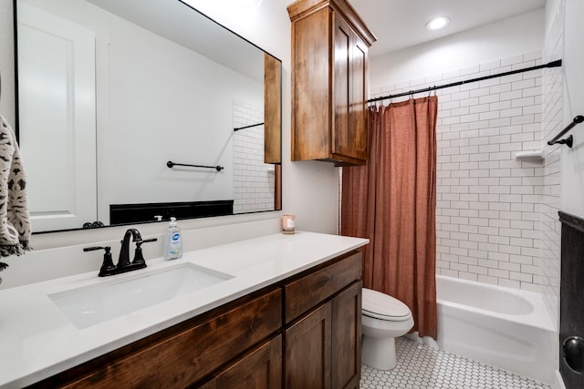 full bathroom featuring vanity, toilet, tile patterned floors, and shower / bathtub combination with curtain