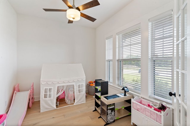 interior space featuring ceiling fan and light hardwood / wood-style floors